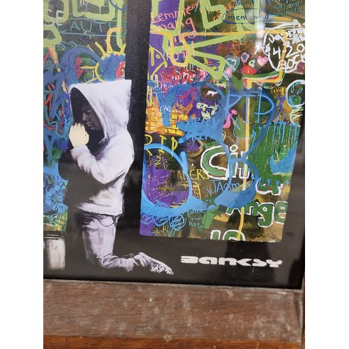 341 - A high quality print of a work originally by the street artist Banksy, titled 