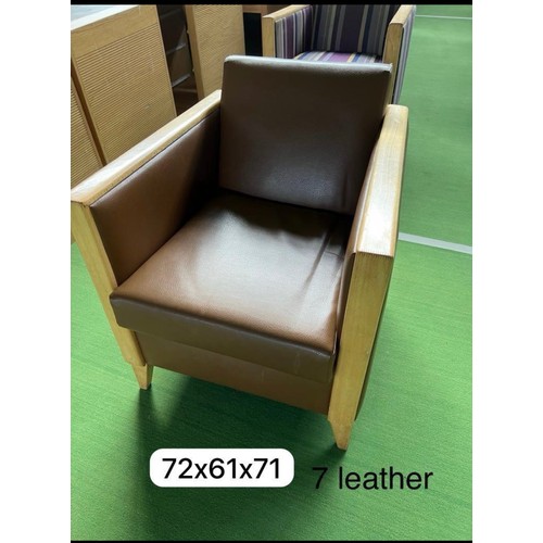 1034 - Two (2) Leather commercial quality Brown leather armchairs. In good order  If purchased they must be... 