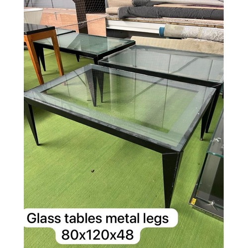 1090 - A large black coffee glass coffee table. We have 4 of these and selling them individually. If purcha... 