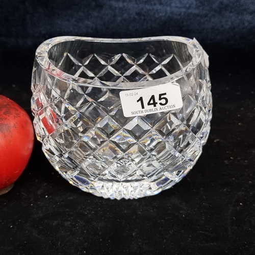 145 - A stunning Waterford Crystal Pillow Bud vase in the Boyne pattern. In good condition with acid mark ... 