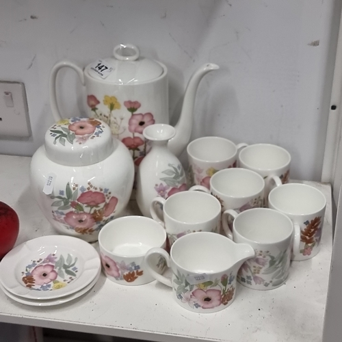 147 - A very pretty Wedgwood Bone China coffee set. Including 6 coffee cups, coffee pot, milk jug, sugar b... 