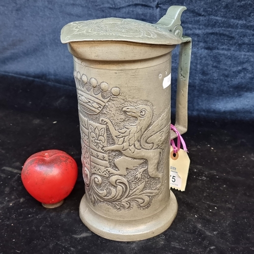 175 - A very impressive 19th century large pewter lidded mug with coat of arms to front. Dealers tag for €... 