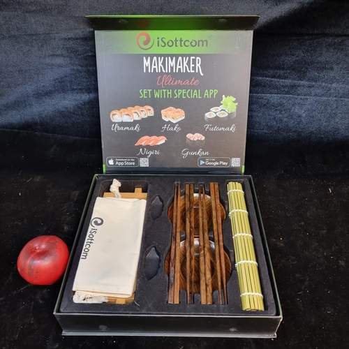 198 - A fantastic iSottcom makimaker sushi set containing bowls, chopsticks and sushi rolling mat.