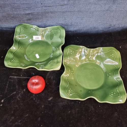 203 - A charming pair of Mancer Italian hand painted ceramic bowls in an emerald green.