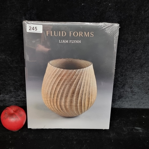 245 - A fantastic large hardback book titled Fluid Forms by Liam Flynn unopened with original seal.