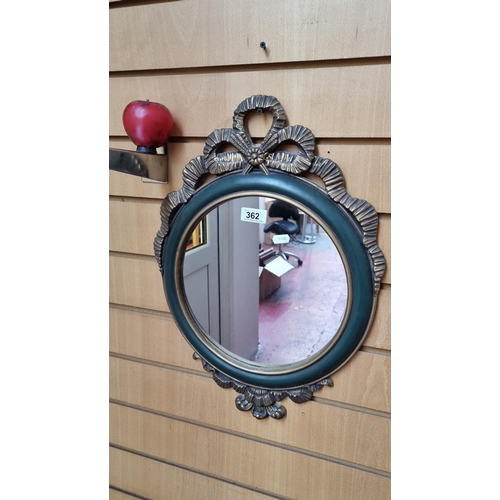 362 - A sweet Italian style green and gilt framed hall mirror.