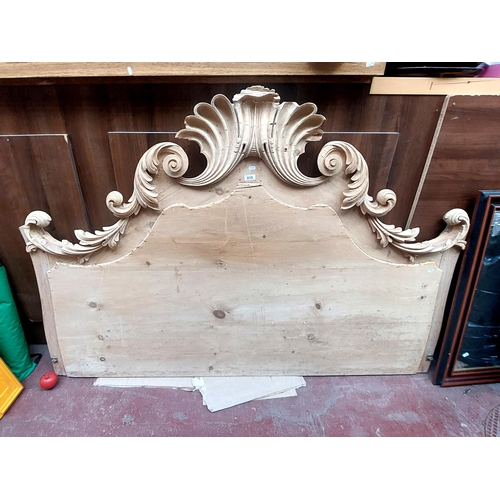 410 - A very impressive large pine headboard with carved scroll detailing. Heavy 2 person lift and would n... 