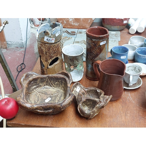 421 - Six fabulous pieces of handmade art studio pottery including three unusual abstract vases.