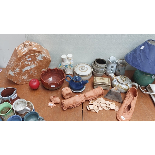 425 - A large impressive collection of approx. twenty pieces of art studio handmade pottery including two ... 