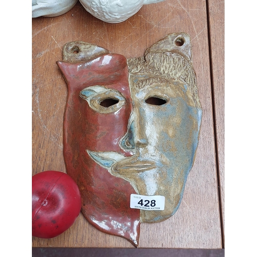 428 - A superb and highly unusual two toned art studio pottery jesters mask.