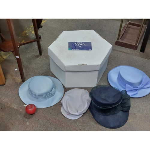 449 - A hat box containing four fabulous ladies hats. Ideal for weddings or a day at the races. With a Roa... 