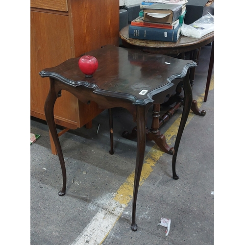 462 - A beautiful 1930s side table boasting gorgeous long cabriole legs  and serpentine apron. From the lo... 