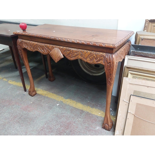 465 - A gorgeous large console table with intricately carved detailing to apron and carved gadrooning, sup... 