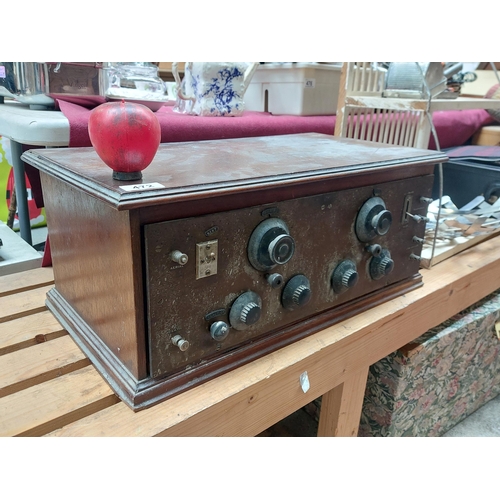 472 - A great looking four valve T.R.F Radio dating to c. 1928. Held in a wooden case. Imagine this all po... 