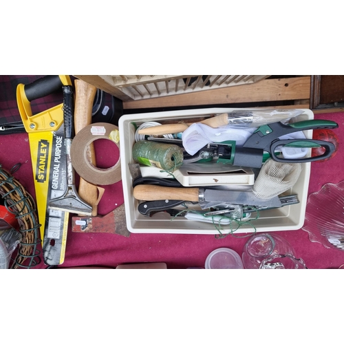 476 - A plastic container holding a large variety of DIY tools such as;  a hammer, saw, scissors, double s... 