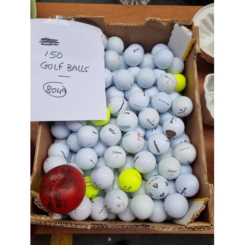 491 - A box containing approx 150 golf balls, from a variety of brands such as Titleist, Callaway and Tayl... 