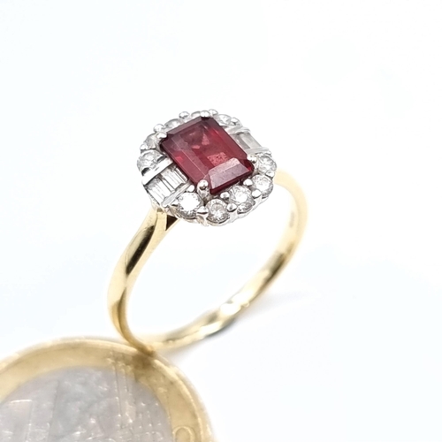 521 - A 9K gold garnet stone ring with gem stone surround, size P, weight 2.9 grams, boxed.