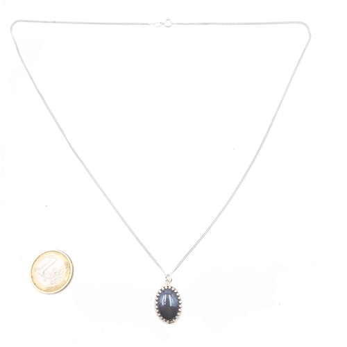 546 - An agate stone pendant necklace with sterling silver chain, length of chain 56cm.