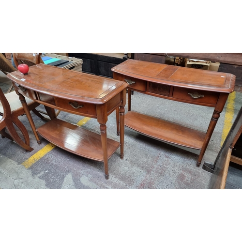 670 - Star Lot : A super pair of vintage console tables featuring a painted inlay to central panels, dovet... 