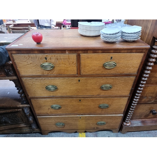 701 - A gorgeous 1920s chest with five pullout drawers boasting beautiful brass hardware in the campaign s... 