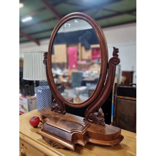 722 - Star Lot : A remarkable  large Victorian swing dressing table mirror with an oval frame on carved su... 