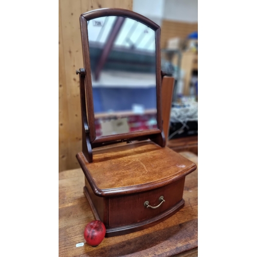 728 - An early 20th century mahogany dressing mirror featuring a nicely sized pullout drawer beneath. From... 