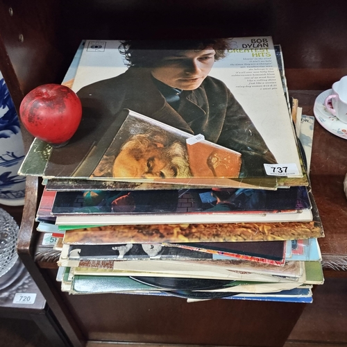 737 - A large collection of vintage vinyl records including artists such as Bob Dylan, Ray Charles, Jim re... 