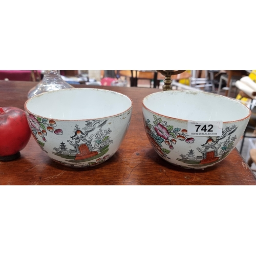 742 - A very beautiful pair of antique Chinese serving tea bowls painted with traditional scenes throughou... 