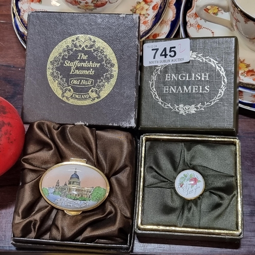 745 - Two very pretty delicate English enamel tiny pill boxes. in original boxes.