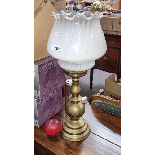 764 - A fantastic large brass table lamp with a large white glass shade with scalloped rim.