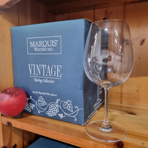 772 - A box of four As new boxed Marquis by Waterford large deep red wine glasses from their vintage tasti... 