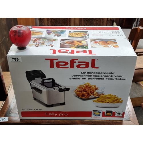 789 - A brand new sealed box Tefal easy pro deep fat fryer in original box.