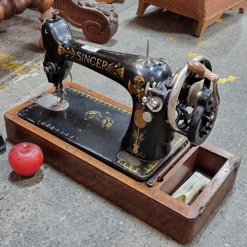 791 - A superb 1930's Singer sewing machine hand painted with floral decoration and sat in its original ca... 