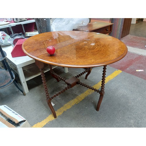 466 - Star Lot : A beautiful 19th century slim line Walnut drop leaf table with lovely off set barley twis... 