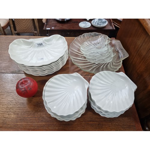 700 - A Super selection of 22 Oyster shaped dishes inching white porcelain and glass sets. All in good con... 