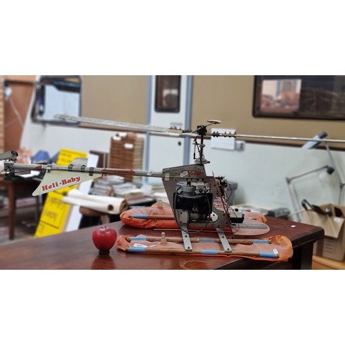 697 - A Fabulous large 1970s Shluter Heli Baby, mini Helicopter, looks in good order no controller. These ... 