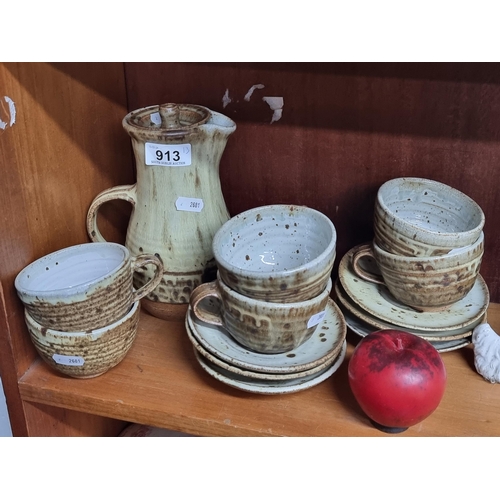 913 - A gorgeous hand thrown art studio pottery coffee set including coffee pot, six cups and six saucers.... 