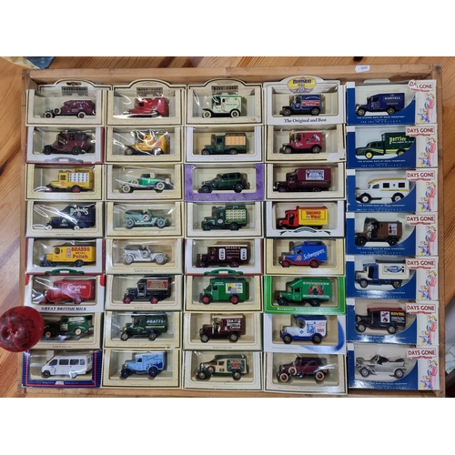 971 - A Vintage collection of 35  Days Gone By die-cast vehicles by Lledo PLC,  in original packaging, evo... 