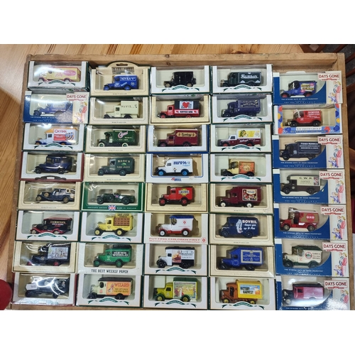 972 - A Vintage collection of 35  Days Gone By die-cast vehicles by Lledo PLC,  in original packaging, evo... 