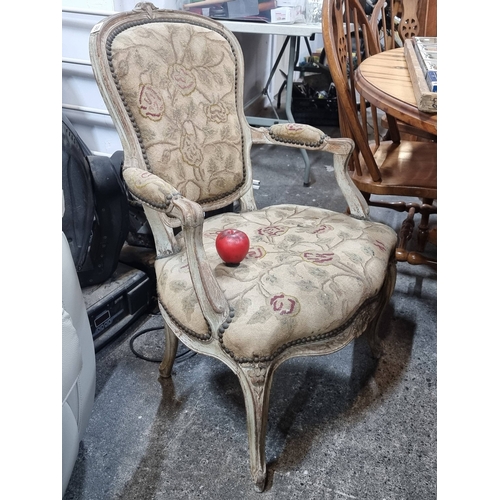 980 - Vintage Louis XV-style armchair, floral upholstery, accented with ornate beaded trim. Lovely classic... 