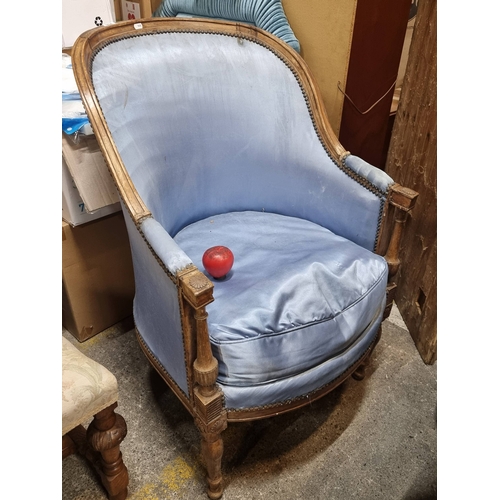 994 - Star Lot : A an antique Louis XV-style chair with carved oak frame and sky-blue silk upholstery, exu... 