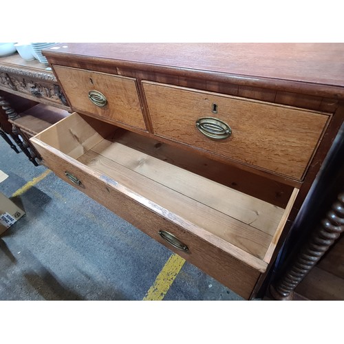 701 - A gorgeous 1920s chest with five pullout drawers boasting beautiful brass hardware in the campaign s... 