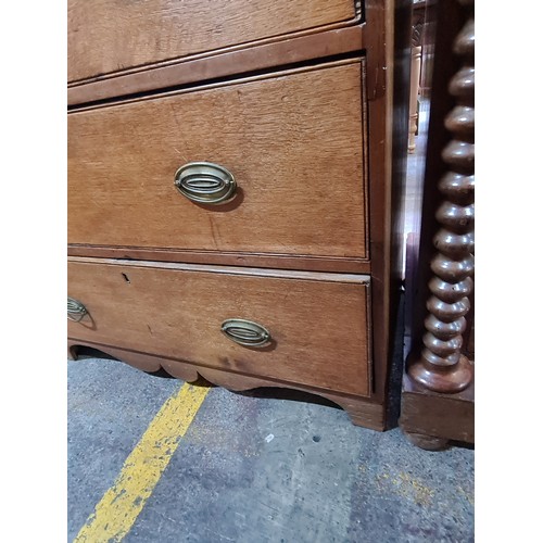 701 - A gorgeous 1920s chest with five pullout drawers boasting beautiful brass hardware in the campaign s... 