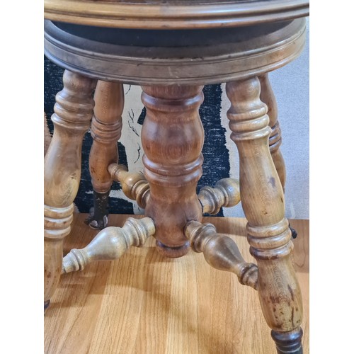 720 - Star Lot : A superb antique Tonk style stool featuring crows talons holding glass ball feet. Present... 