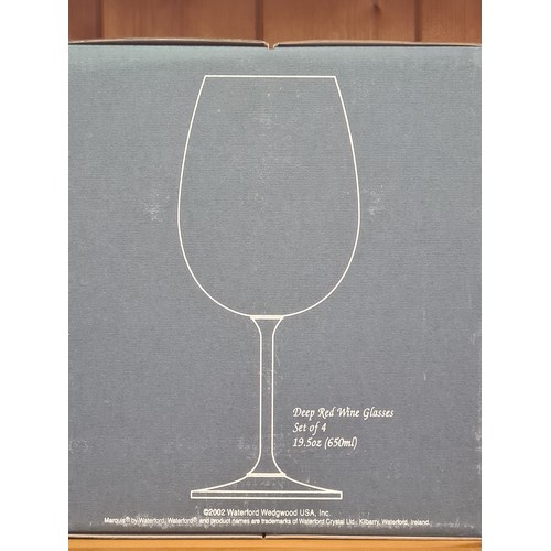 772 - A box of four As new boxed Marquis by Waterford large deep red wine glasses from their vintage tasti... 