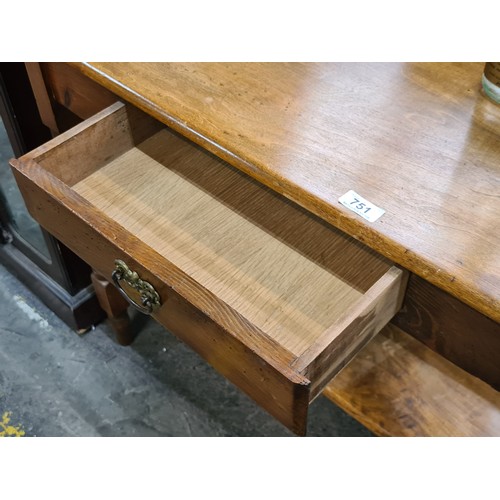 751 - Star Lot : A beautifully made antique Elm  washstand featuring one pullout drawer with brass handle,... 