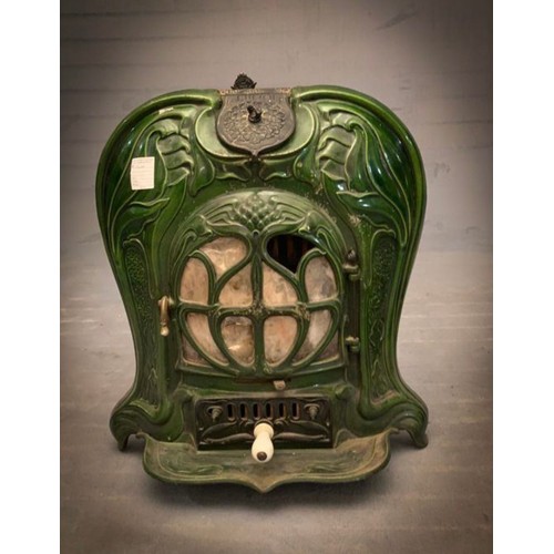 1002 - Super Star Lot :  A rare original antique Art Nouveau Luciole Heater in working order. In a copper f... 