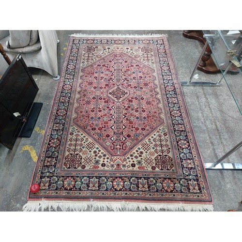 748 - Star Lot : A totally fantastic handmade, handknotted Persian rug with fabulous colours and detail. W... 