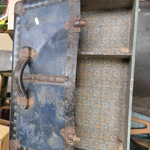 661 - A super vintage trunk / chest with brass stud reinforcements to sides and top, opening to reveal lar... 