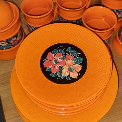 756 - Eighteen pieces of vibrant Italian made Sicas pottery including saucers, side plates, cups and a lid... 